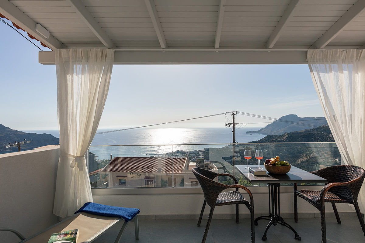 The spacious balcony with the amazing view to the bay of Plakias and the mountains