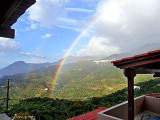 Winter Holidays in Crete - Amazing rainbow view from the apartments on a rainy Winter day