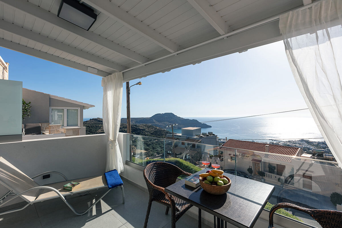 The spacious balcony with the amazing view to the bay of Plakias and the mountains