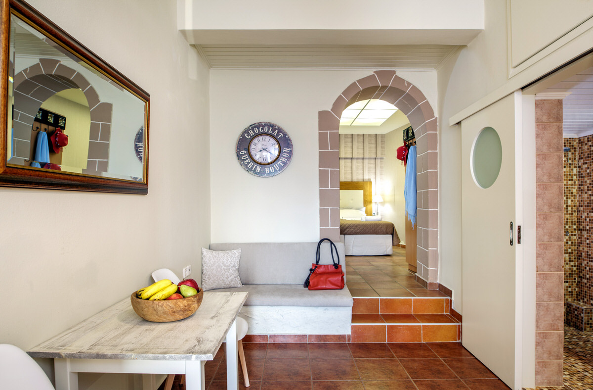 The dinning and sitting corners of the kitchen room