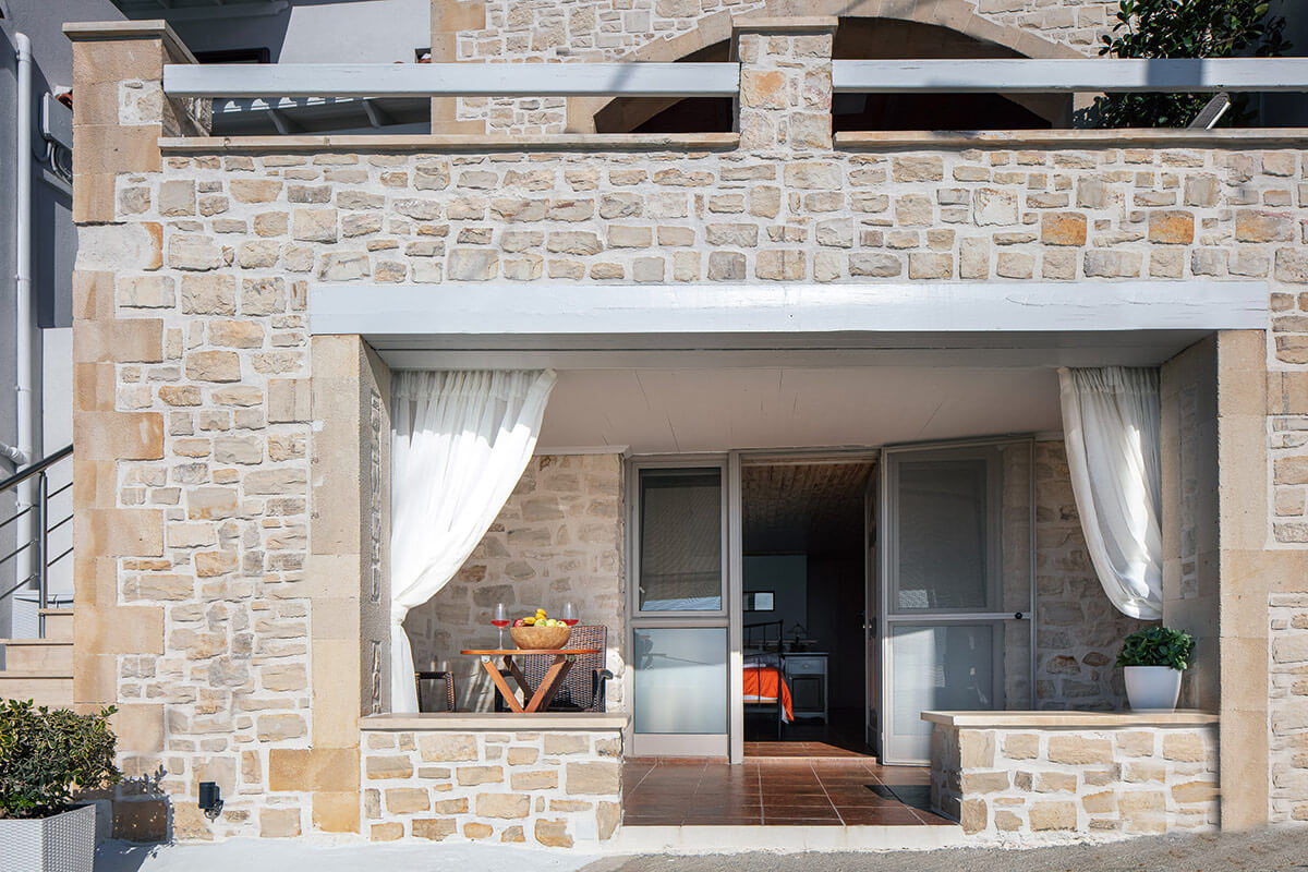 The stone-built entrance balcony as it looks from the garden