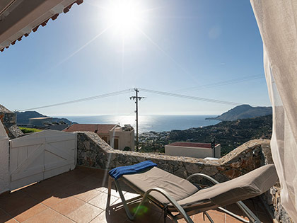 Enjoy the sun and the view of the sea & mountains from the balcony of a Deluxe apartment