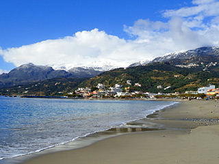 Winter Holidays in Crete - Plakias beach on a snow Winter day